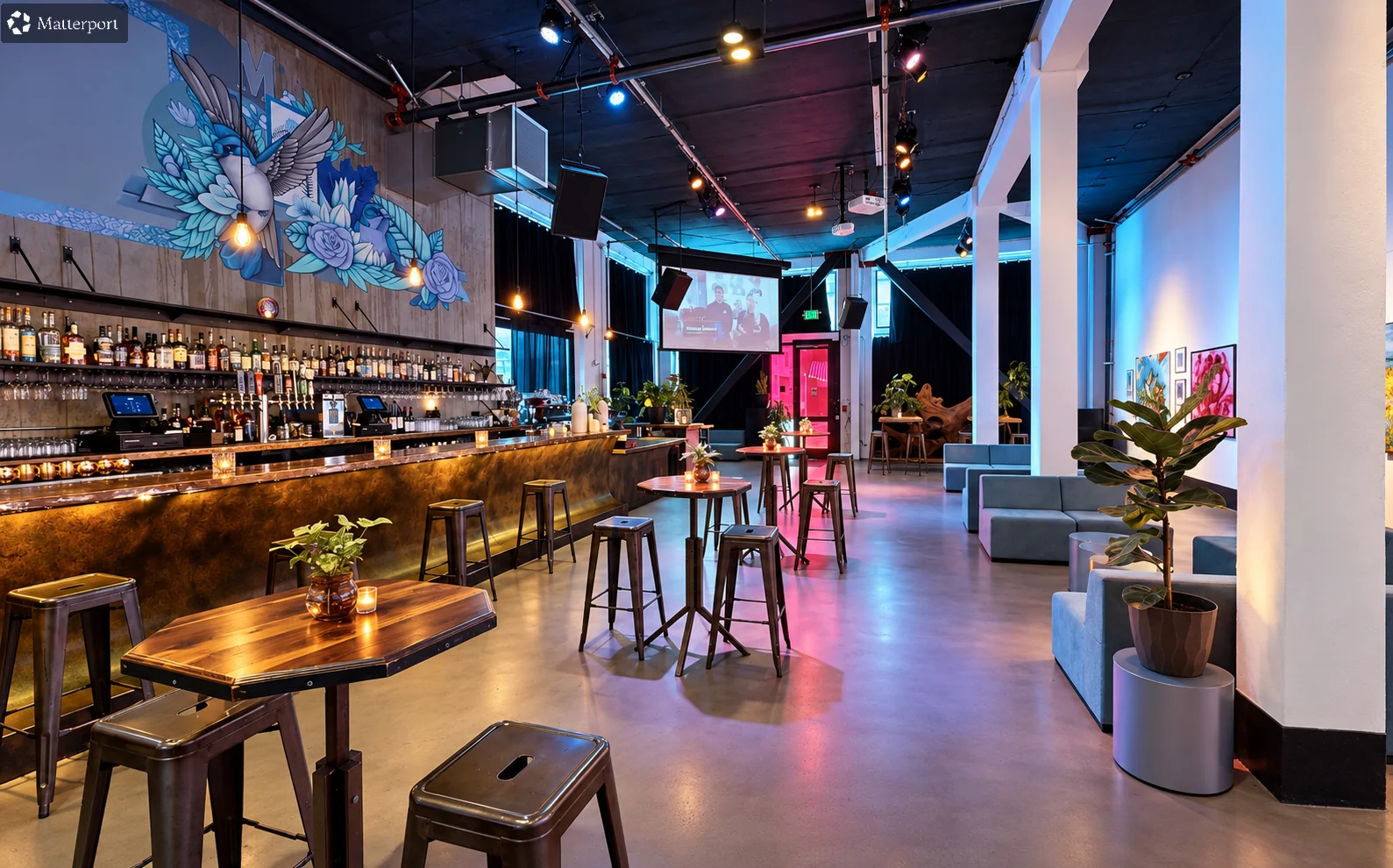 Long brass bar, gallery floor and lounge seating in the Second Street Gallery at 111 Minna Gallery.
